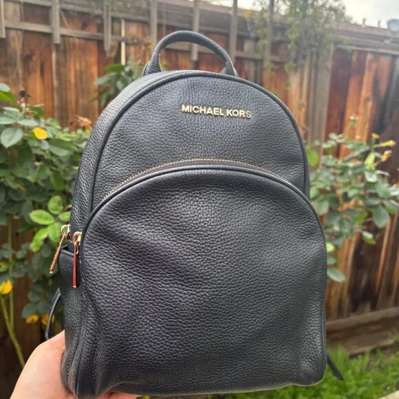 Authentic Michael kors black leather backpack purse